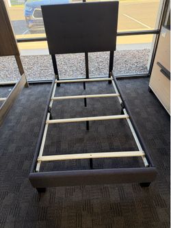 Twin gray upholstered bed frame
