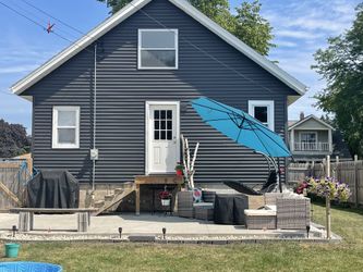 Two Full Size Teal Patio Umbrellas