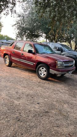 2005 Chevy avalanche with tags and title