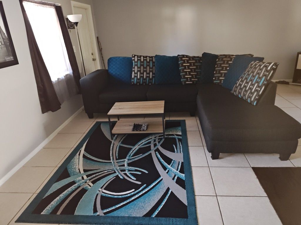 Sofa Sectional , Coffee Table, Rug And Lamp Set