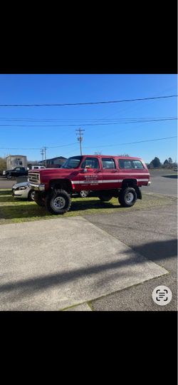 1989 lifted Suburban w/ barn doors
