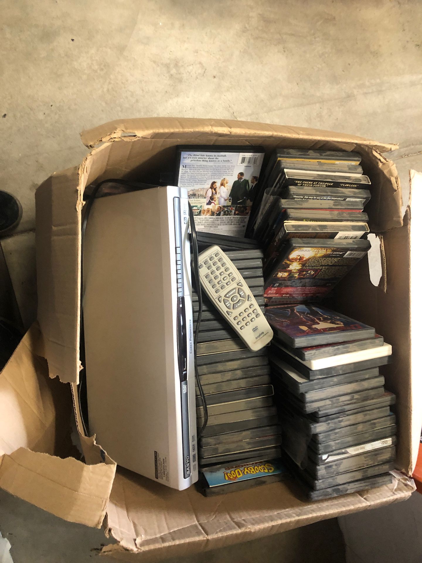 DVD player and 75 DVDs from kids to adults