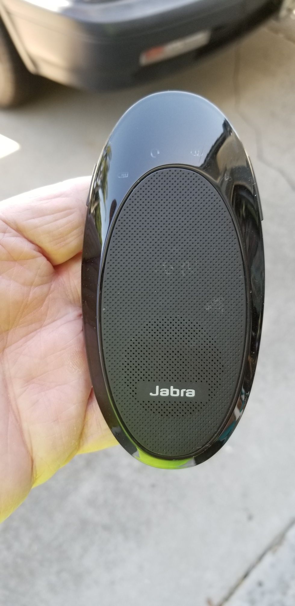 Jabra SP700 bluetooth car visor speaker.