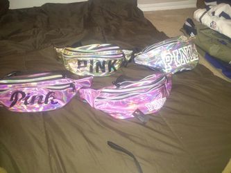 Pink wallet and fanny pack