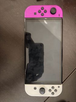 Nintendo Switch with Pink and White Joy-Cons