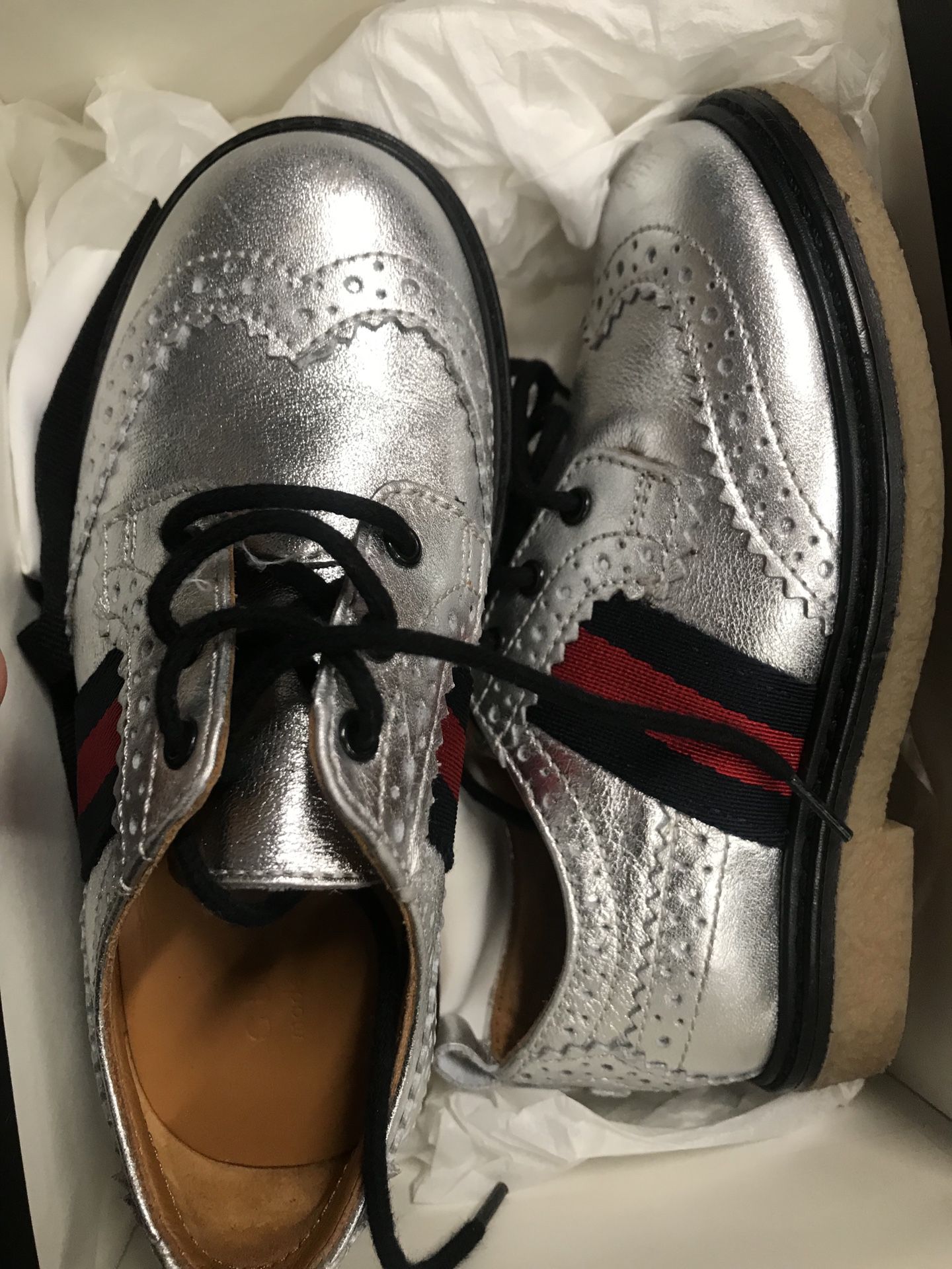 Gucci metallic children shoes size 7. Asking $175 or best offer. Paid $410. (Serious inquiries only please). Little boys size 7