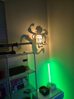 Handmade 3D printed anime-style shadow wall lamp.