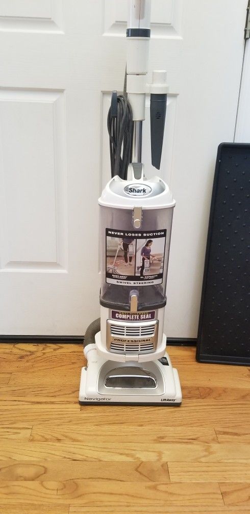 SHARK NAVIGATOR VACUUM CLEANER WITH AMAZING WATER SUCTION ,