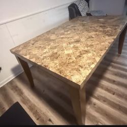 Real Marble dinning table with wooden legs 70"×42"x 31" new in condition Solid wood legs, real marble top and heavy table