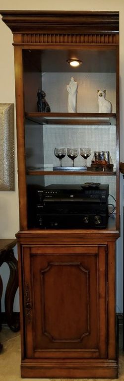 Two pieces buffet with storage and shelves for decorations all in very good condition.