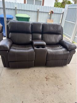 Brown recliner love seat