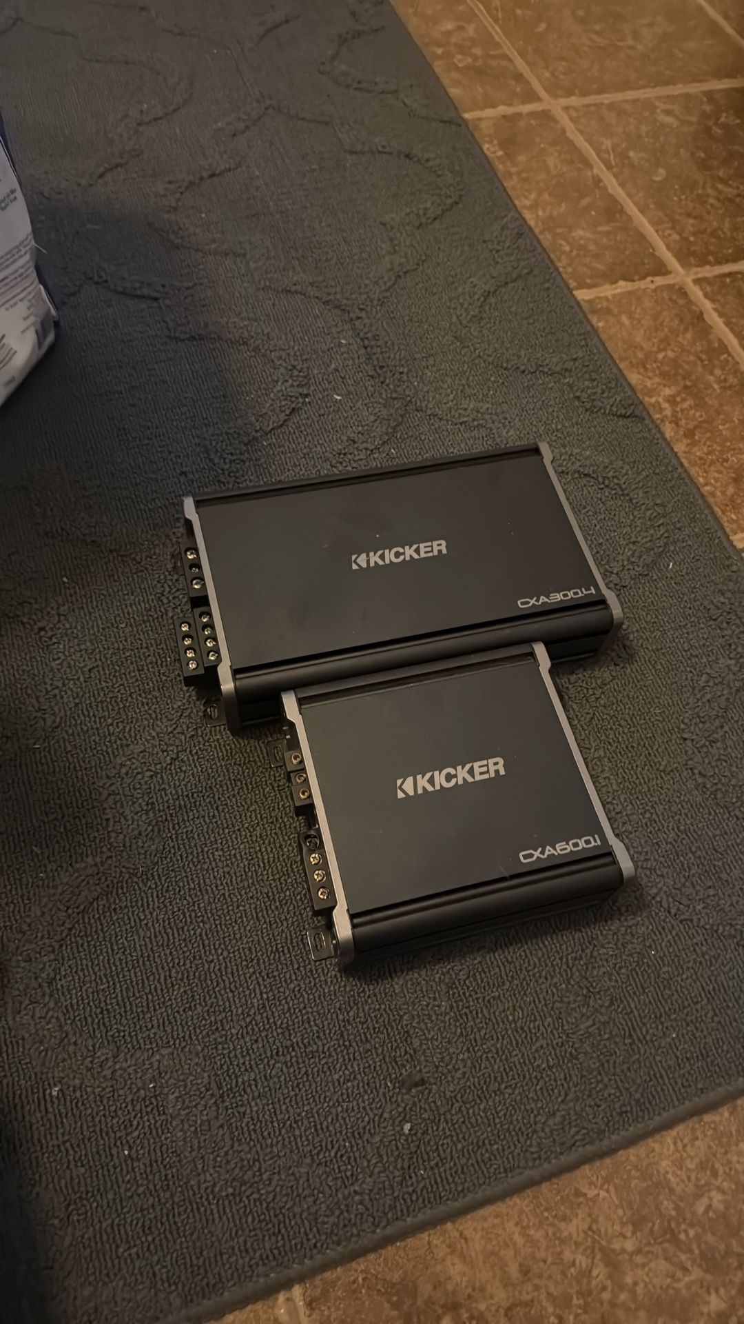 Two Kicker amps