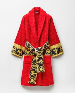 red Versace bathrobe features a plush jacquard logo pattern and signature Baroque-printed trim on the cuffs