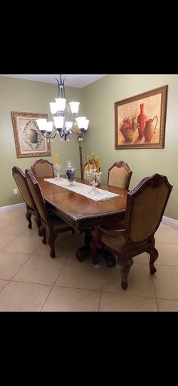 Elegant dining room set with six chairs.