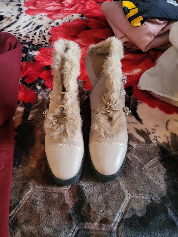 Una Mesedora Para Bebe Un Par De Botines 7 Una Saco Para Hombres L