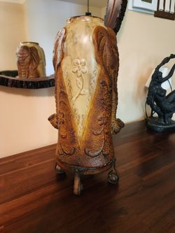 Vintage, Coated metal vase.  Elephants with uplifted trunks symbolize happiness.