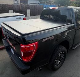 Covers. Tapas. 2004 to 2026 Ford F-150 5.5ft Hard Tri Fold Bed Covers