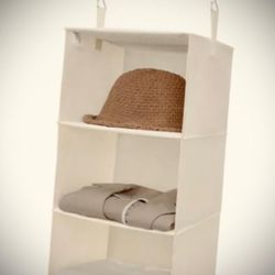 HANGING CLOSET ORGANIZER, WITH 3 PLASTIC SHELVRS. SIZE: 11" X 12.5" HIGHT: 56". EXCELLENT CONDITION!