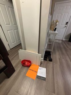 White TV Stand / Entertainment Center – Unassembled
