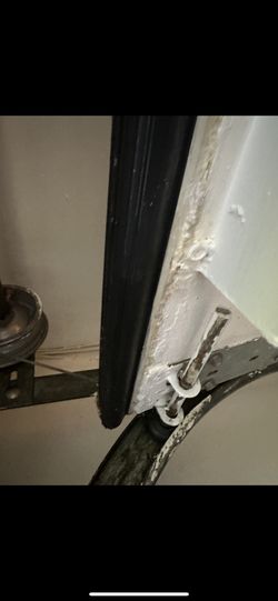 Garage Door Seal Installations And Greasing 