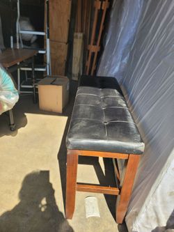 Dining bench $20 dusty in storage unit