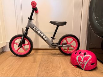 Strider Balance Bike + Rocking Base + Pink Bell Helmet