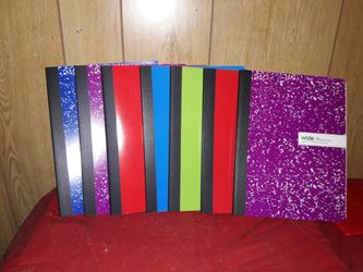 Wide ruled composition books.
