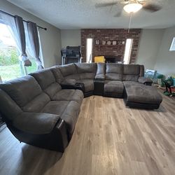 Black And Gray Suede And Leather Reclining Couch