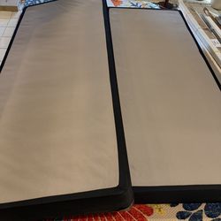 Two California box spring with adjustable bed rails on wheels