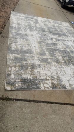 Grey and gold area rug