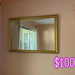 Beautiful ornate antique gold framed wall mirror