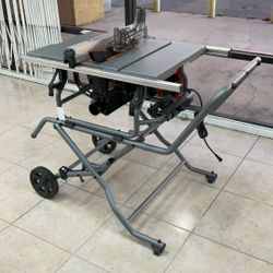 RIDGID TABLE SAW WITH BEVEL LOCK LEVER.