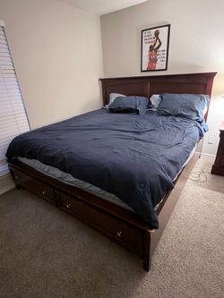King bed frame with mattress and night stand