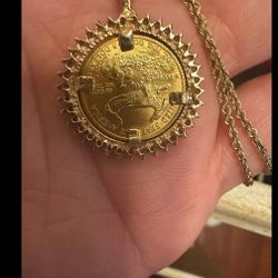 22k 1/10 American eagle pendant with 14k gold rope chain
