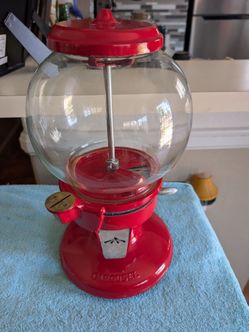 Carousel red gumball machine