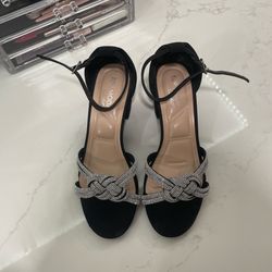 Black heels with silver glittery straps