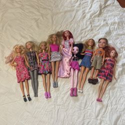 Nine Assorted Barbies  