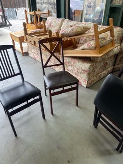 Three folding chairs