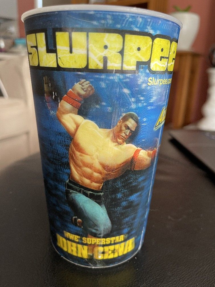 This is a collectible 7-Eleven Slurpee cup featuring WWE superstar John Cena.