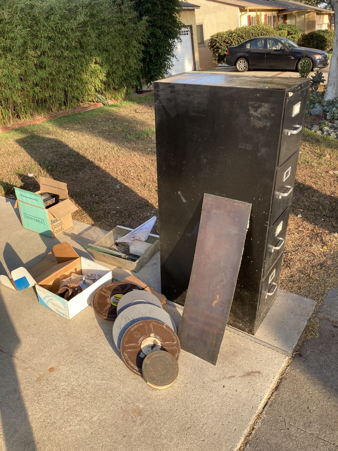 Free at the curb metal filing cabinet and film reels and cases