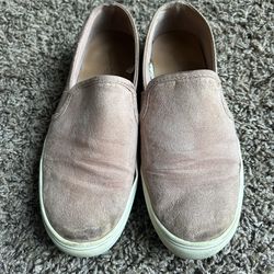 Pink target slip on shoes