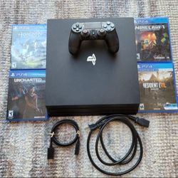 PS4 Pro 1Tb + Controller + 4 Games