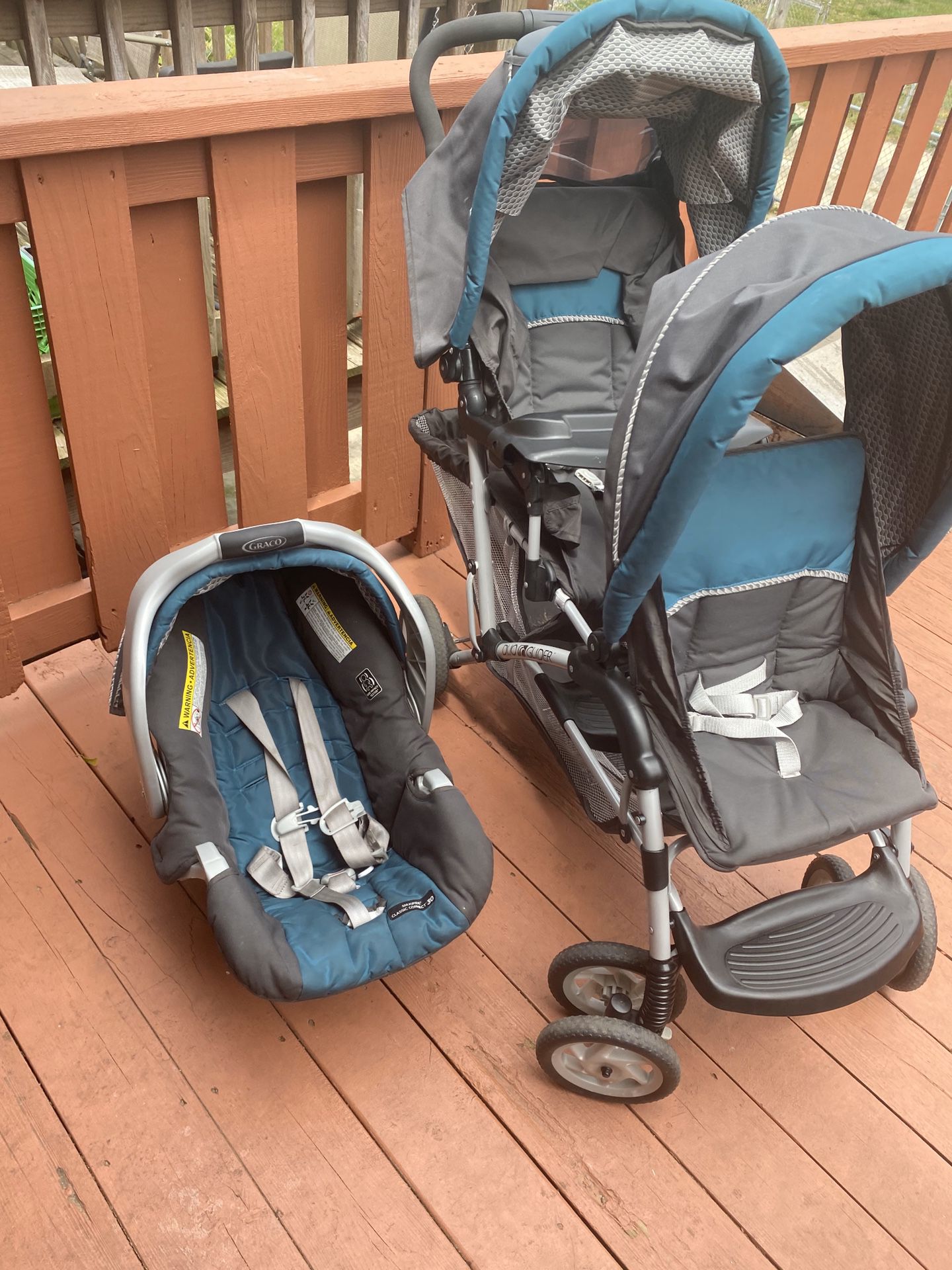 Graco car seat and double stroller.