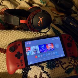 Nintendo switch oled with gaming headphones