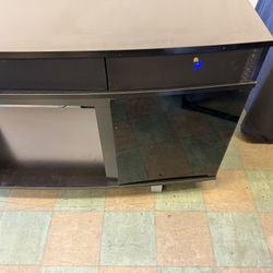 Black TV Stand W/Blue Tooth Spkrs. 