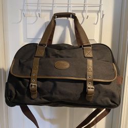 BELLA RUSSO DUFFLE BAG WITH WHEELS  BLACK, GRAY, BROWN TRIM  PERFECT TRAVEL BAG!  PRICE NEGOTIABLE