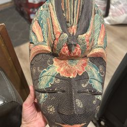 Hand-Carved Wooden Mask with Peacock Motif – Batik Style Wall Decor