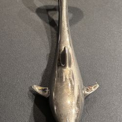 Vintage Dolphin bottle cap opener.