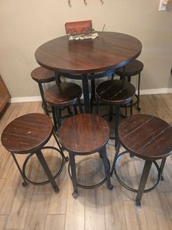 Round Pub Table with 6 Bar Stools