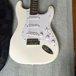 Squire Guitar With Case And Amp